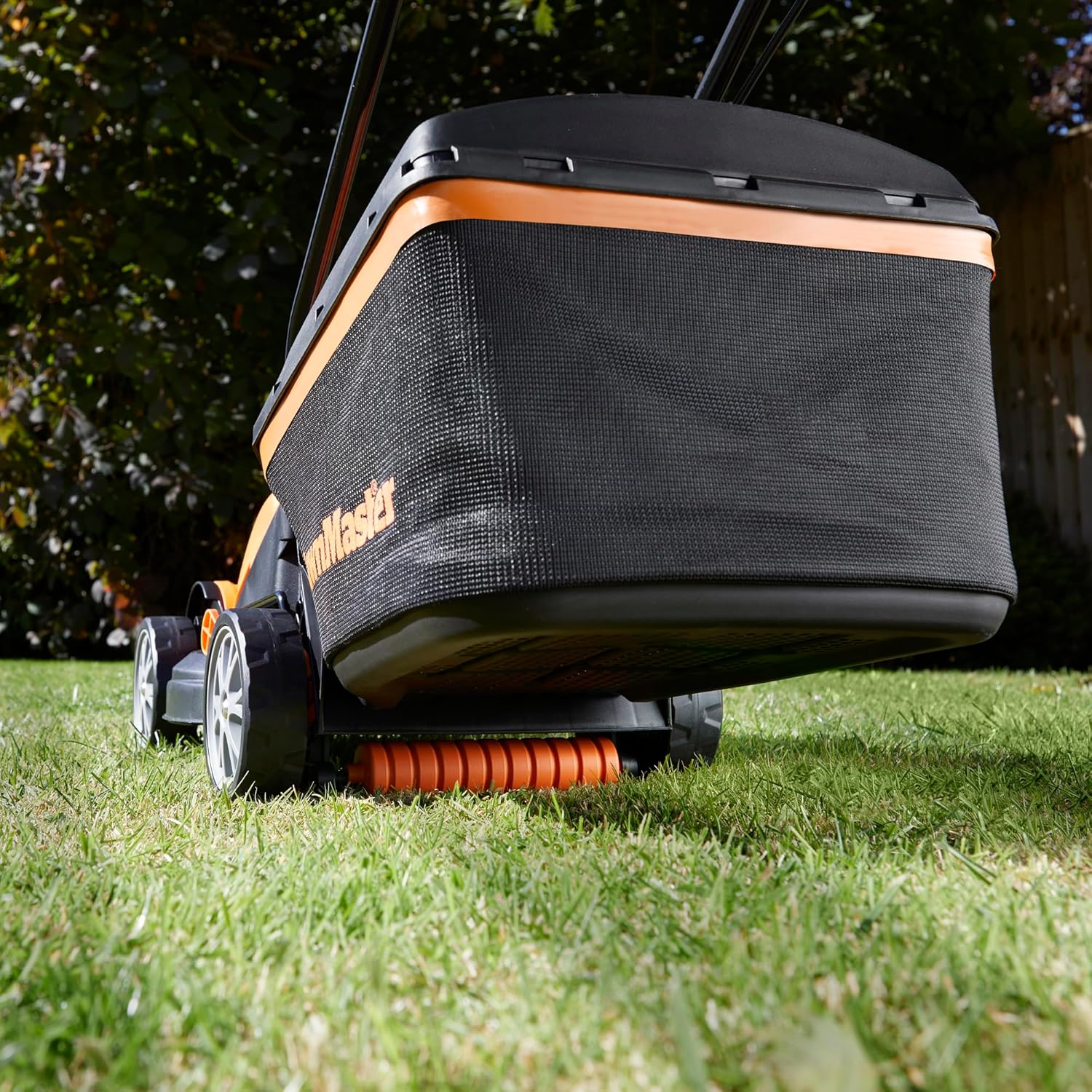 LawnMaster 1200W Electric Lawn Mower with 32cm cutting width, ideal for small lawns. With 5 adjustable cutting heights and rear roller for striped finish, 2 year guarantee